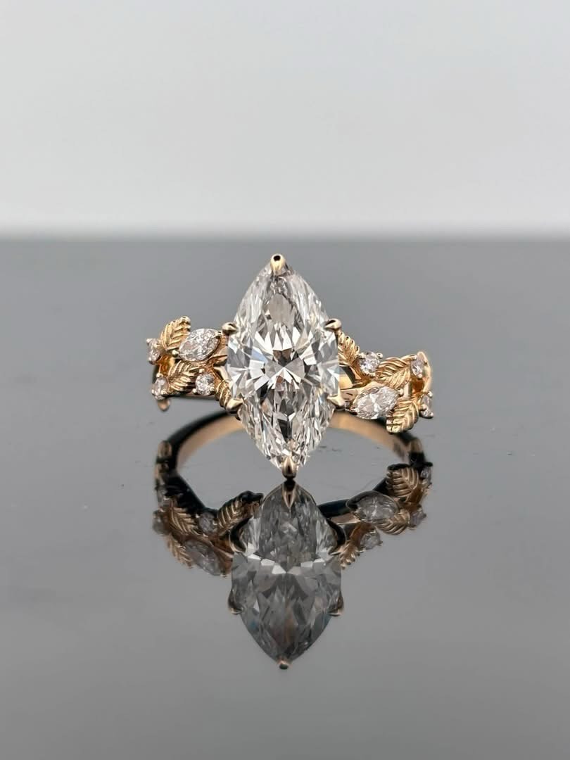 Marquise diamond ring in two-tone gold