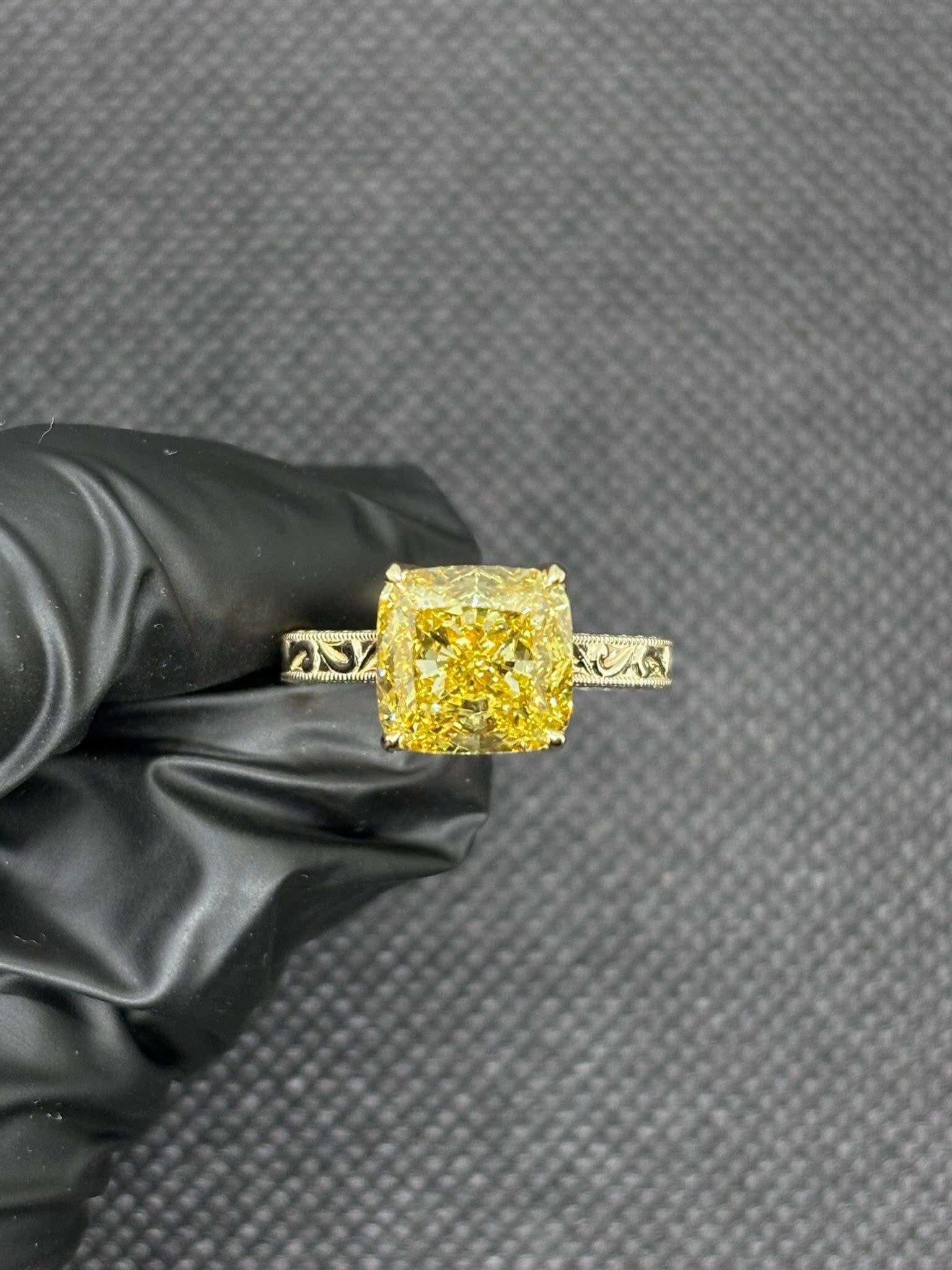Fancy yellow radiant diamond ring
